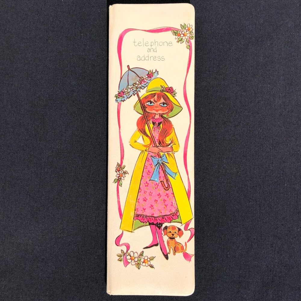 vintage telephone and address book 1970s Japan Mod flowers lady raincoat Emson